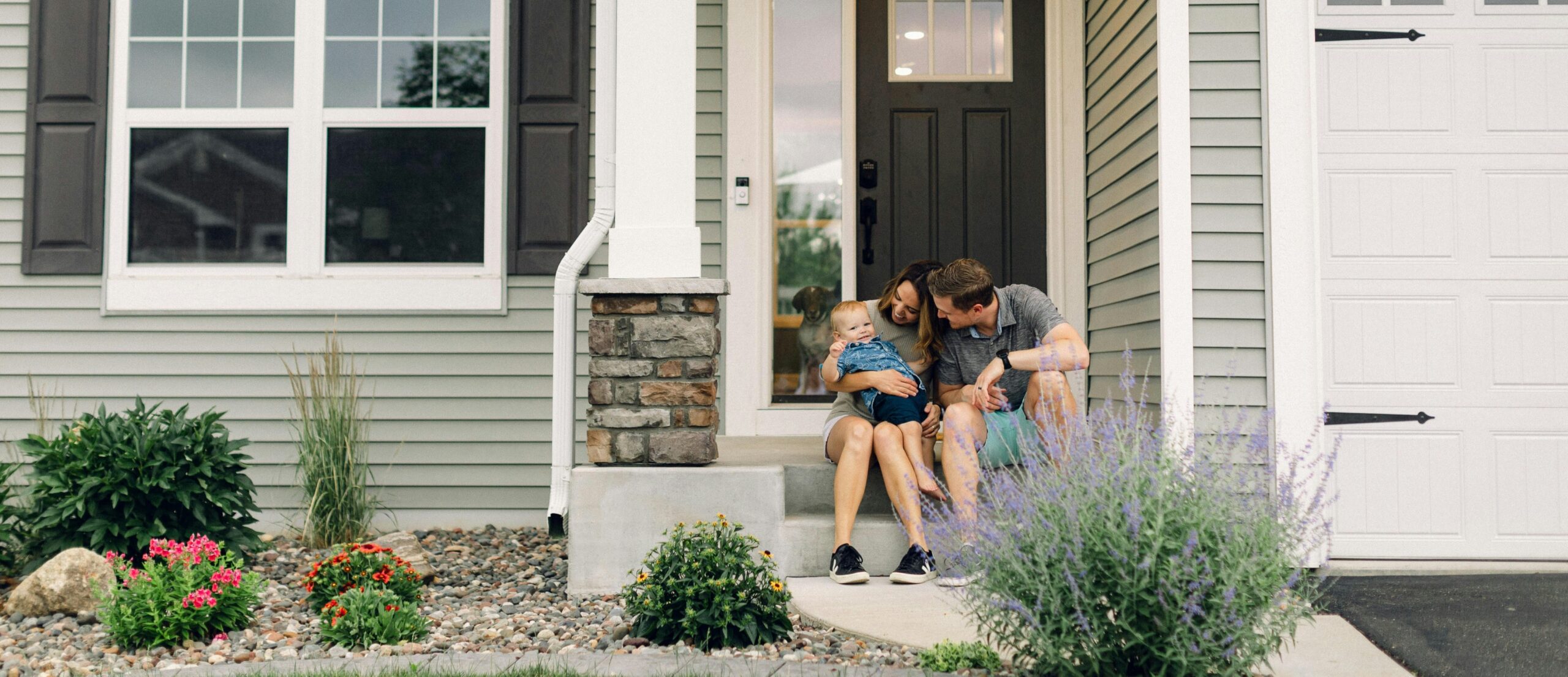 Professional couple reviewing insurance coverage at home